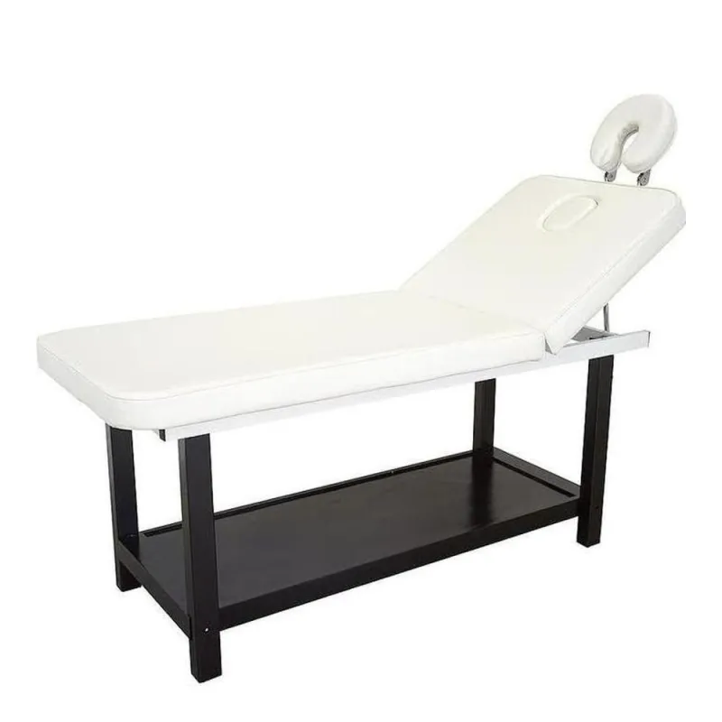 Camilla fija de 2 cuerpos de madera en color wenge. Plataforma inferior para almacenaje. Respaldo regulable manualmente con agujero facial y reposacabezas regulable. Tapizado blanco en PVC fácil de limpiar. WK